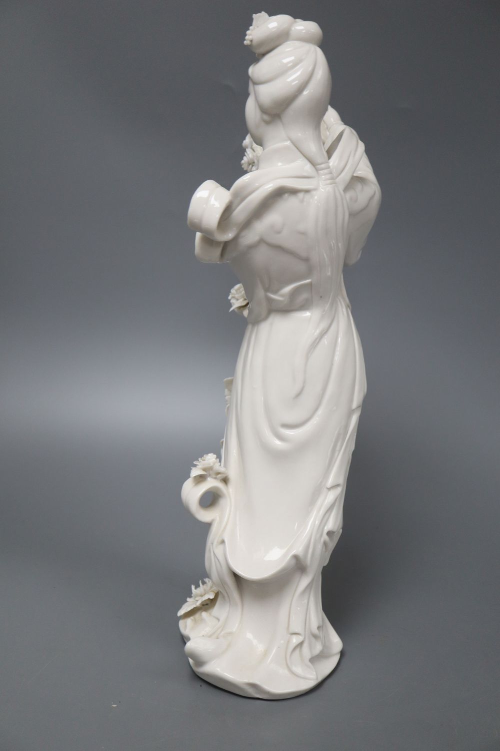 A blanc de chine figure of Kwan Yin (minor faults), H.37cm